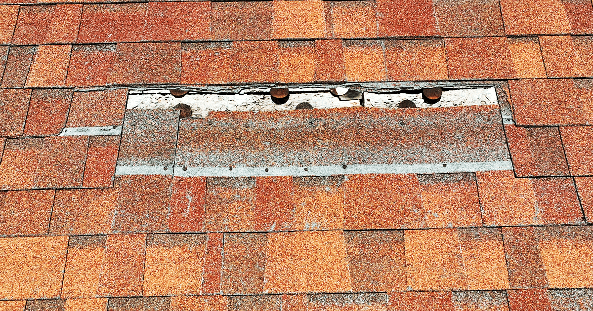 The image depicts a damaged roof that illustrates the consequences of improper installation by a non-certified contractor, highlighting the importance of hiring certified contractors to ensure compliance with industry standards and maintain warranty protection. This damage can lead to costly repairs and void roof warranties, emphasizing the need for proper roofing system installation to safeguard structural integrity and resale value.
